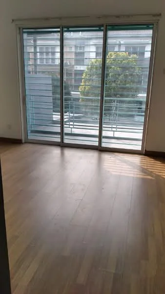 Living features: wooden flooring, floor-to-ceiling sliding glass doors, natural light from large windows, balcony view, neutral wall color, roller blinds, open layout, no visible furniture; style: modern; view: garden.