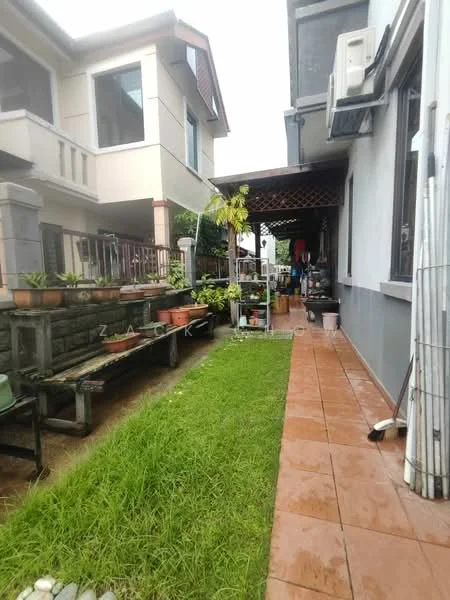 Exterior type: semi-detached house; features: manicured lawn, paved walkway, covered porch, garden area with potted plants, side access pathway, adjacent houses, outdoor storage area; style: modern.