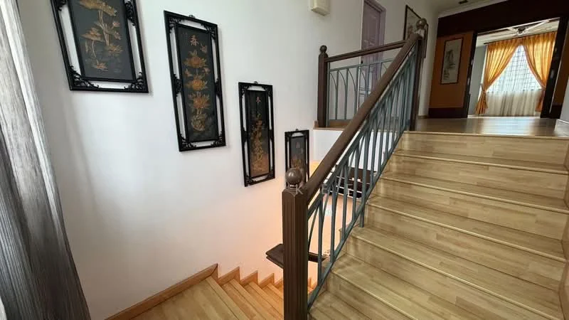 Room features: wooden staircase, handrail with metal balusters, light wood flooring, decorative wall art, white painted walls, natural light from window, curtains, open space at the top of the stairs; style: modern.