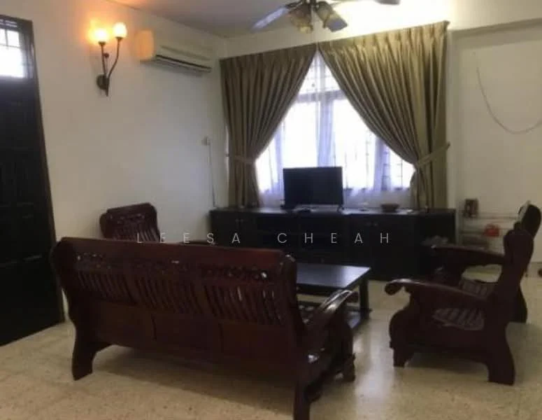 Living features: 2-seater wooden sofa with intricate carvings, 3-seater wooden sofa with intricate carvings, coffee table, TV console, wall-mounted TV, floor-to-ceiling windows with sheer curtains, cream painted walls, ceiling fan with light, air conditioning unit, decorative wall sconce, light-colored flooring; style: traditional.