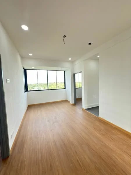 Room features: laminate flooring, white painted walls, large windows with black frames, recessed downlights, open layout, natural light, view of greenery, corner room; style: modern; view: garden.