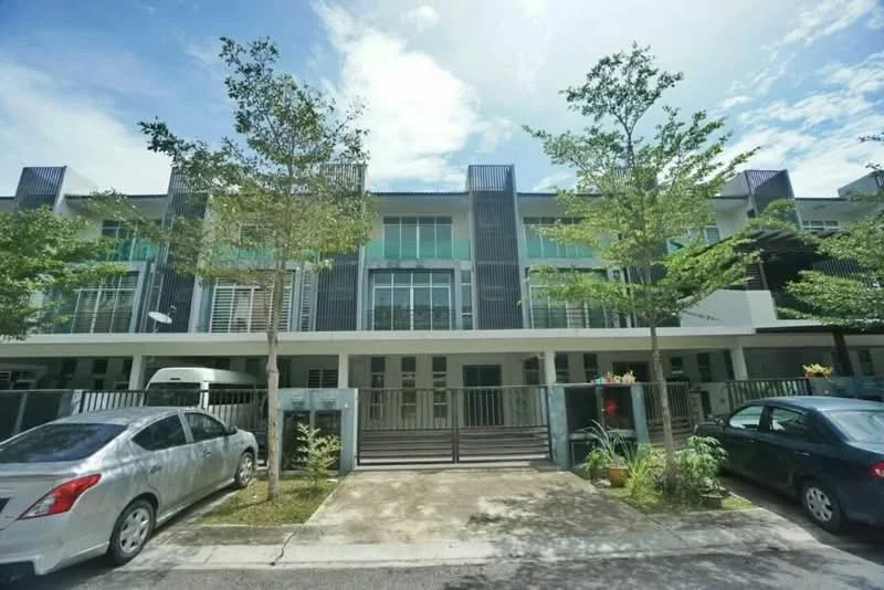 Exterior type: linked terrace house; features: modern facade with glass and metal elements, two-storey structure, manicured landscaping with small trees, paved driveway, fenced front yard, multiple windows on upper and lower floors, balconies on upper floors, car parking space, front entrance with gate; style: modern.