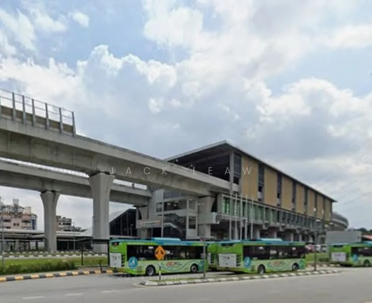 Exterior type: transportation hub; features: elevated train tracks, bus terminal with multiple buses, modern architectural design, large glass windows, concrete structure, surrounding roadways, parking area for buses, urban setting, cloudy sky; style: modern.