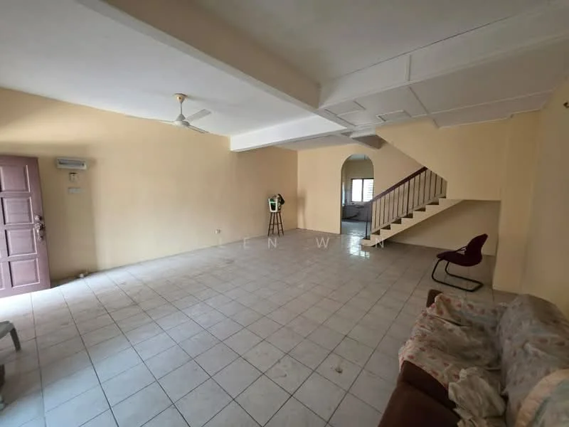 Living features: white painted walls, tile flooring, 5-blade ceiling fan, arched doorway, staircase with wooden railing, large windows, sofa, single chair.