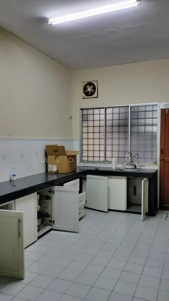 Kitchen features: black countertop, white cabinetry, under-sink storage, open shelving, double-bowl stainless-steel sink, chrome faucet, wall-mounted exhaust fan, tile flooring, window with grid pattern, door leading outside.