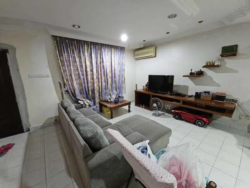 Living features: grey fabric sofa, coffee table, wall-mounted TV, TV console, floor tiles, curtains with floral pattern, air conditioning unit, decorative shelves, light fixtures in ceiling.