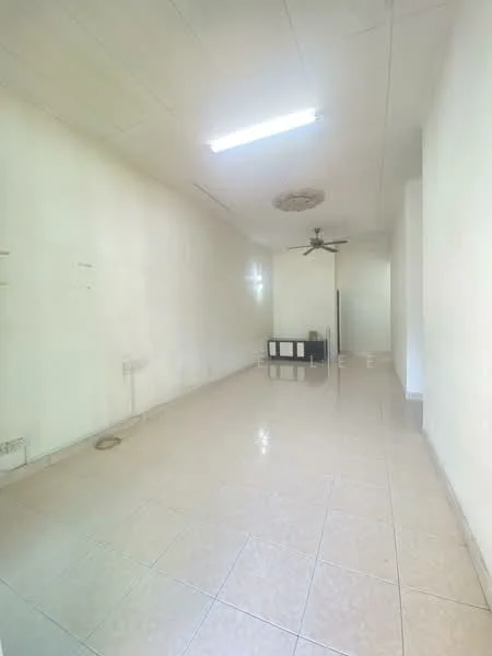 Room features: white painted walls, tile flooring, ceiling fan, fluorescent ceiling light, empty space, no visible furniture, single wall-mounted electrical outlet, no visible windows; style: minimalist.