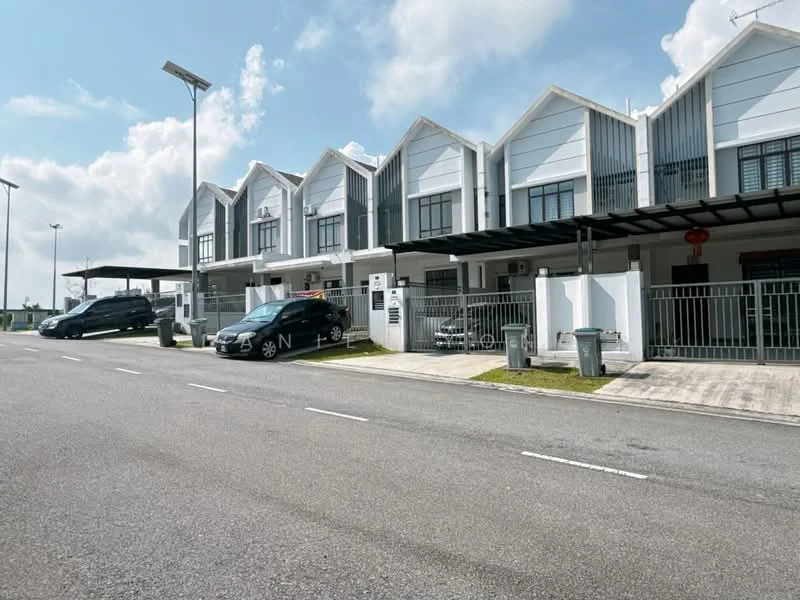 Exterior type: linked terrace house; features: white painted facade, flat roof, 2-storey, car porch with awning, manicured lawn, paved driveway, security gate, visible parking spaces, street lighting, surrounded by greenery; style: modern.