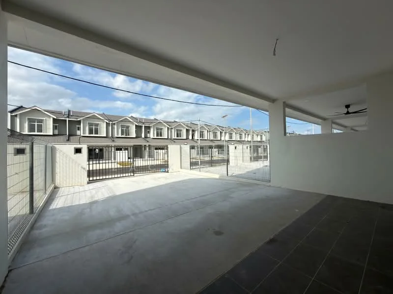 Exterior type: linked terrace house; features: fenced perimeter, concrete flooring, covered porch area, multiple windows, gated entry, clear sky view, adjacent row of houses; style: modern.