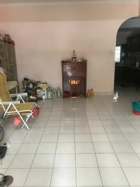 Room features: white painted walls, glossy ceramic tile flooring, arched doorway, wooden cabinet, various bottles and containers on the floor, folding chair, decorative heater, open space layout.