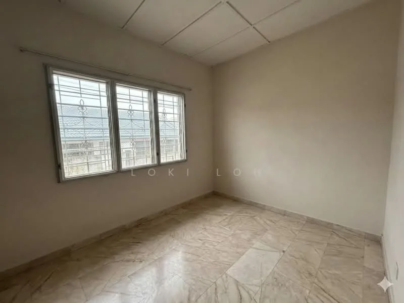 Room features: white painted walls, marble tile flooring, ceiling with grid panels, three-pane window with security bars, natural light from window.
