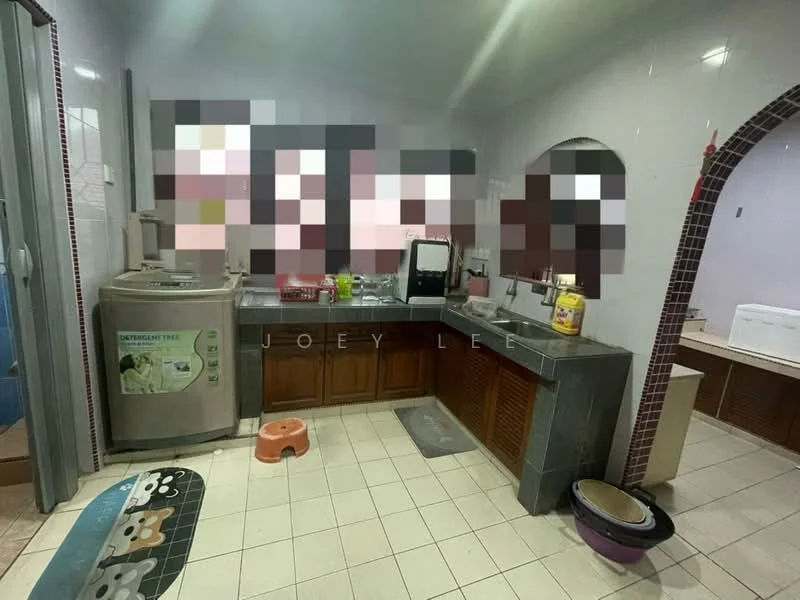 Kitchen features: wood cabinetry, stainless-steel sink, chrome pull-down faucet, countertop with tile backsplash, built-in washing machine, freestanding refrigerator, ceramic tile flooring, white painted walls, window with sheer curtains, kitchen island, stool seating.