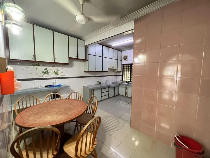 Kitchen features: light grey cabinets with white handles, blue countertop, white tiled backsplash, round dining table with pink marble top, 4 wooden dining chairs, white walls with floral decals, cream tiled flooring, ceiling fan, built-in kitchen sink, oven, kitchen window with grid pattern, pink tiled wall, open shelving; style: traditional.