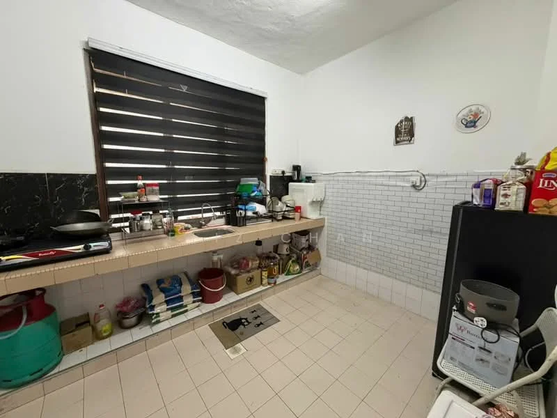 Kitchen features: black granite countertop, white tiled backsplash, white tiled flooring, black roller blinds on window, wall-mounted shelves, kitchen sink, stainless-steel fridge, various kitchen appliances, cooking utensils, storage containers, open shelving, gas stove, wall-mounted electrical outlets; style: modern.