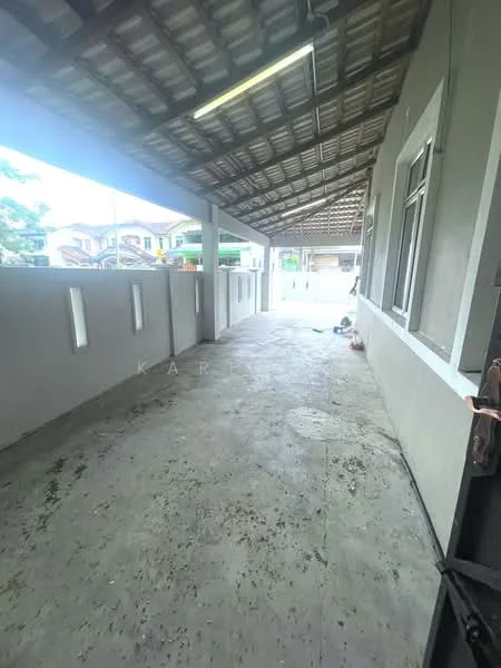 Exterior features: covered walkway, concrete flooring, exposed beams in ceiling, white painted walls, windows along the wall, open space, surrounded by residential buildings.