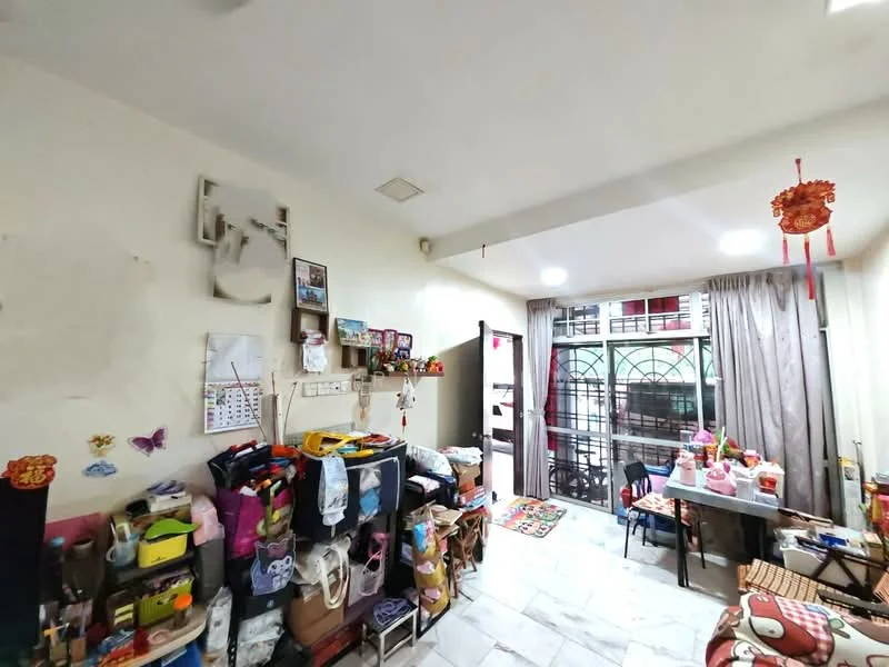 Room features: white painted walls, marble flooring, floor-to-ceiling windows, curtains, dining table, various storage boxes, decorative wall art, multiple chairs, colorful area rug.