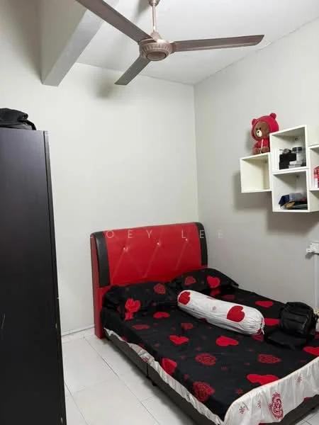 Bedroom features: queen-size bed with red headboard, black bedding with red heart pattern, white throw pillow, ceiling fan with 3 blades, white painted walls, white tiled flooring, black wardrobe, floating shelf with decorative items; style: modern.