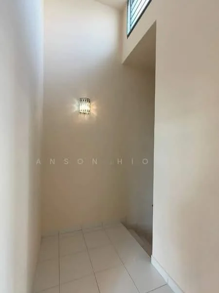 Room features: cream painted walls, white tiled flooring, wall-mounted light fixture, staircase visible, high ceiling, window for natural light; style: modern.