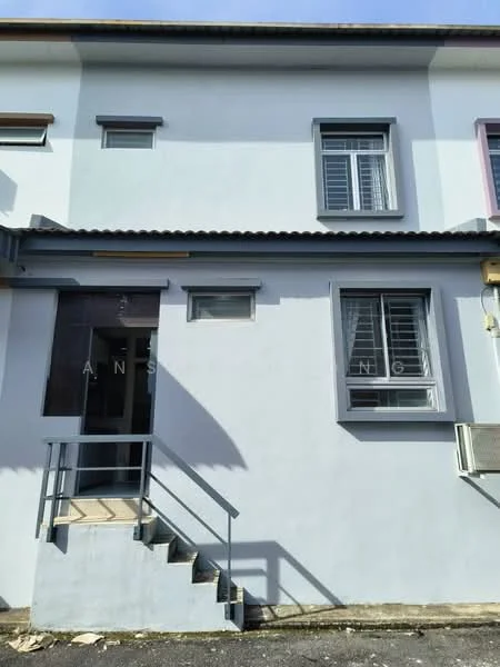 Exterior type: linked terrace house; features: light blue painted facade, metal roof, staircase leading to entrance, window with horizontal bars, air conditioning unit visible, front door with glass panel, grey window frames, concrete steps; style: modern.