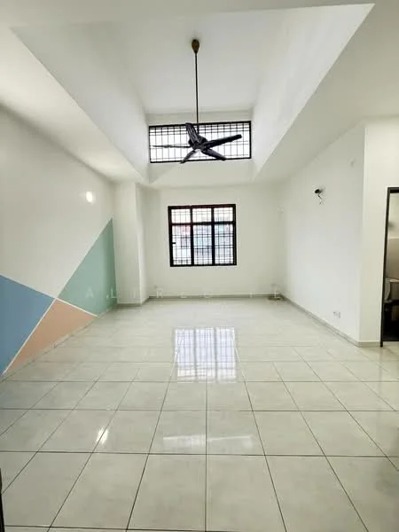 Living features: white painted walls, tray ceiling, ceiling fan, large windows, glossy ceramic tile flooring, natural light from windows, corner accent wall with geometric design, no visible furniture; style: modern.
