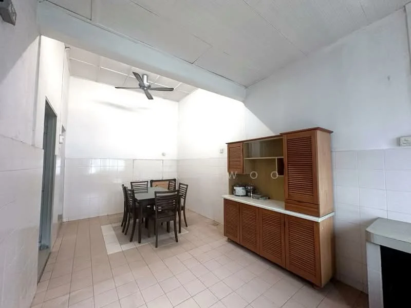 Kitchen features: white tiled walls, light grey tiled flooring, wooden cabinetry, dining table with six chairs, ceiling fan, countertop with sink, wall-mounted shelves, open layout with high ceiling; style: minimalist.