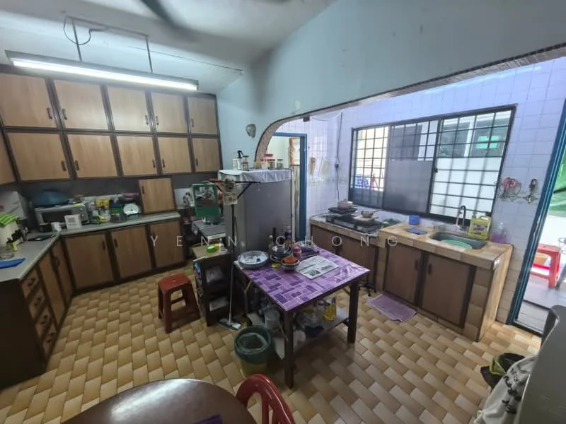 Kitchen features: brown wooden cabinetry, grey countertop, double-bowl stainless-steel sink, chrome pull-down faucet, built-in gas stove, microwave, refrigerator, tile backsplash, ceramic tile flooring, window with grid pattern, overhead fluorescent lighting, kitchen island with purple tablecloth, red plastic stools; style: traditional.