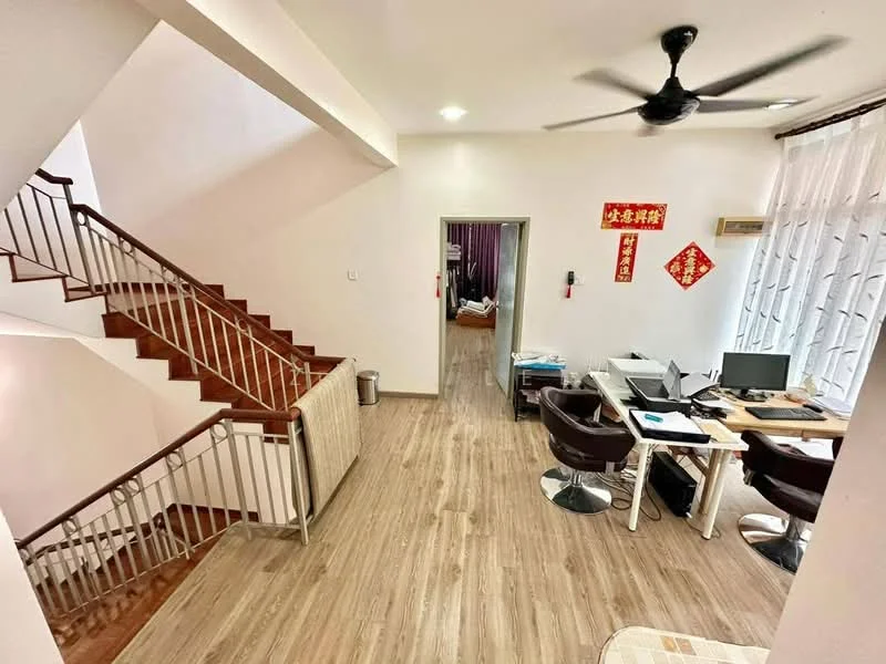 Room features: wooden flooring, white painted walls, ceiling fan, staircase with wooden steps, metal railing, large windows with sheer curtains, office desk with computer, two black leather chairs, decorative wall hangings, recessed lighting; style: modern.