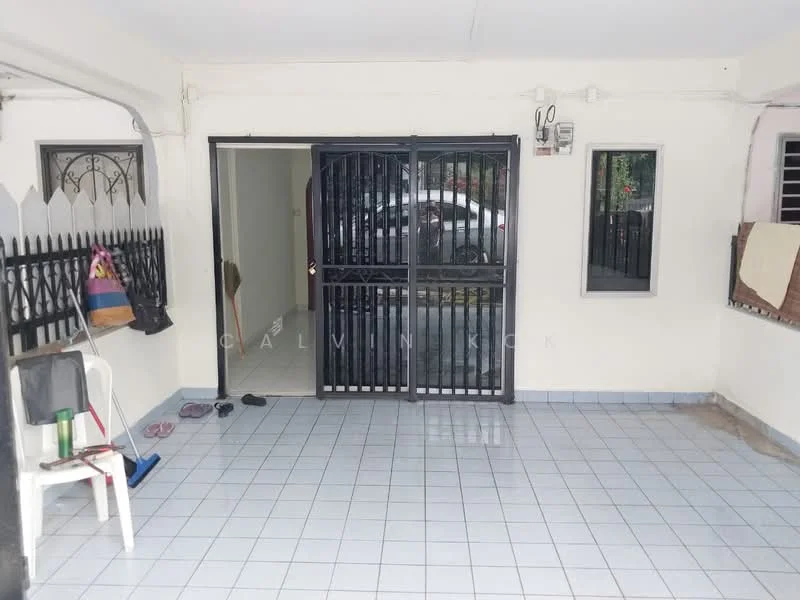 Exterior type: linked terrace house; features: tiled flooring, metal security gate, white painted walls, two windows, manicured garden area, covered porch, fenced perimeter, parking space visible; style: modern.