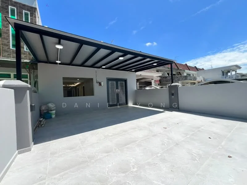 Exterior features: flat roof with metal beams, grey tiled flooring, white painted walls, outdoor lighting fixtures, open space, surrounded by low walls, partial view of adjacent buildings, clear blue sky; style: modern.
