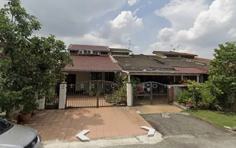 Exterior type: linked terrace house; features: red tiled roof, cream painted facade, iron gate at entrance, paved driveway, manicured garden, mature trees, front porch area, multiple air conditioning units on roof, decorative plants in pots; style: modern.