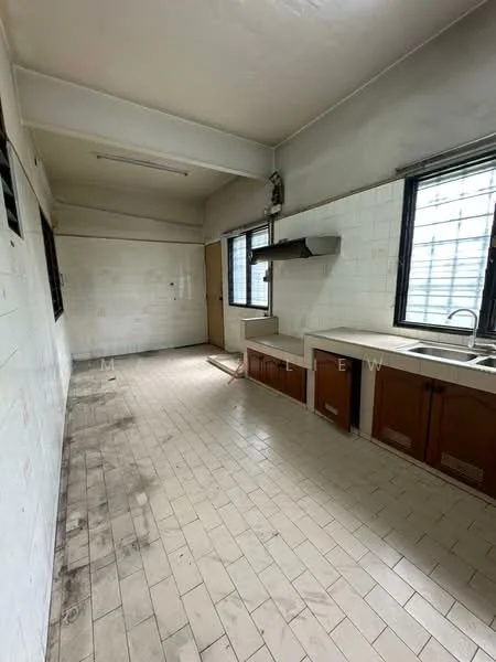 Kitchen features: white tiled walls, light grey tiled flooring, single-bowl stainless-steel sink, chrome pull-down faucet, kitchen cabinetry with wood finish, exhaust hood, window with metal grilles, door leading to another room.
