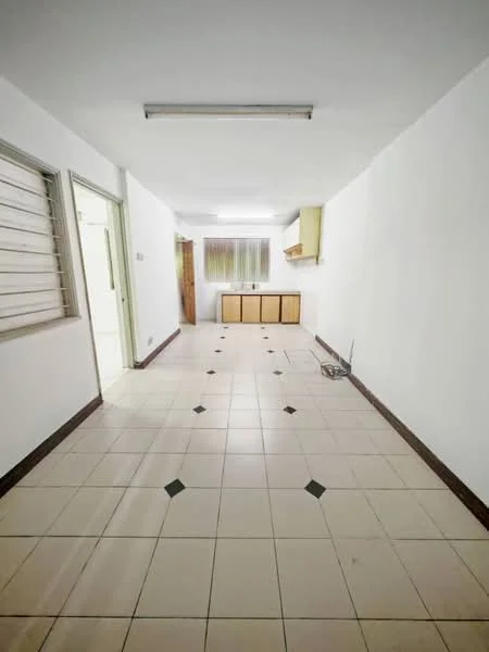 Room features: white painted walls, tile flooring with black accents, ceiling lights, window with horizontal slats, built-in cabinetry, kitchenette area, open layout, neutral color scheme; style: minimalist.