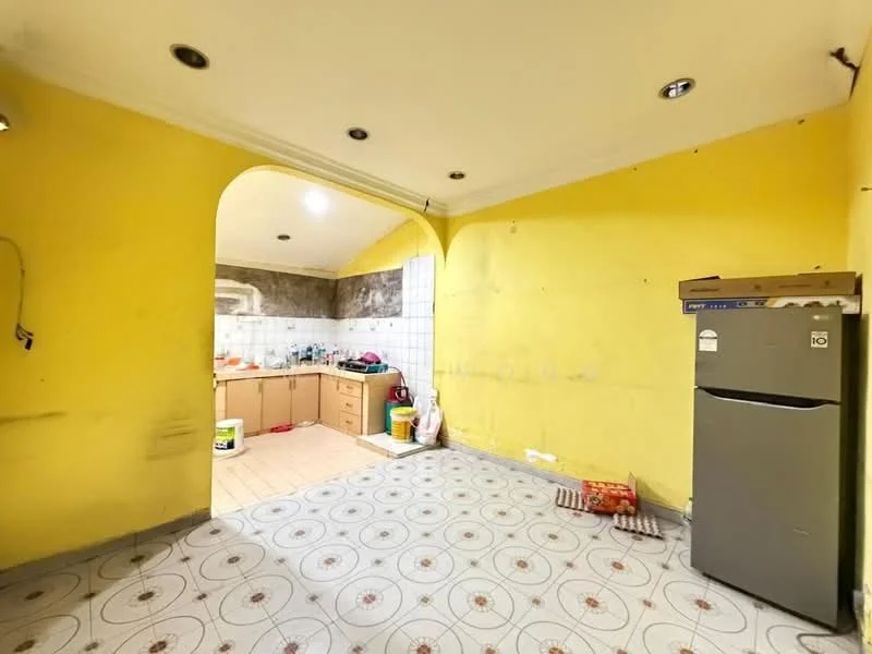Room features: yellow painted walls, tile flooring with geometric pattern, recessed ceiling lights, fridge, kitchen cabinetry, sink, open layout, archway leading to another room.