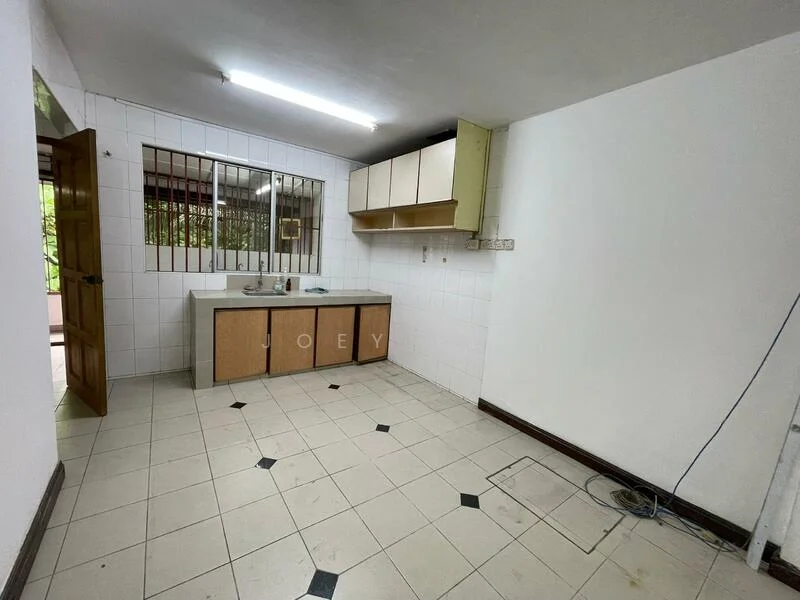Kitchen features: white tiled walls, light grey tiled flooring, single-bowl stainless-steel sink, chrome faucet, wooden cabinetry with beige doors, countertop with grey surface, window with security bars, door leading to outside, overhead cabinets, fluorescent ceiling lights.