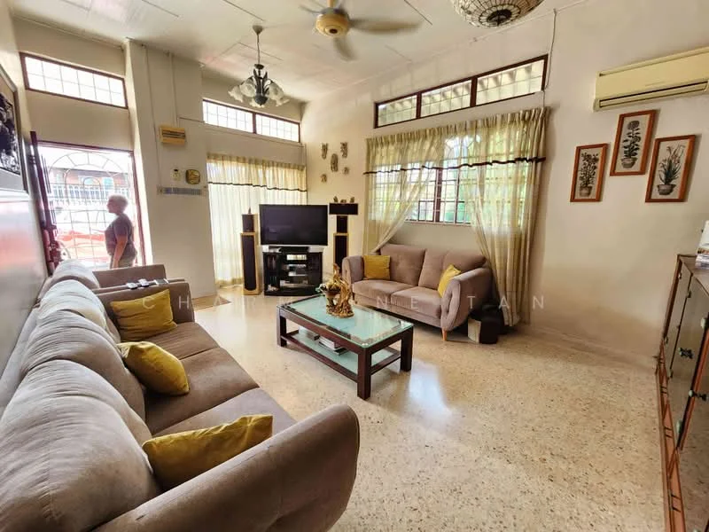 Living features: 3-seater fabric sofa in beige, 2-seater fabric sofa in beige, yellow accent cushions, wood coffee table, wall-mounted TV, TV console, decorative wall art, ceiling fan, large windows with sheer curtains, light-colored walls, speakers on either side of the TV, polished stone flooring; style: traditional.