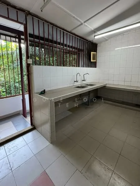Kitchen features: double-bowl stainless-steel sink, chrome pull-down faucet, white tiled walls, grey tiled flooring, countertop with storage underneath, window with security bars, open doorway leading outside, greenery visible through window; view: garden.