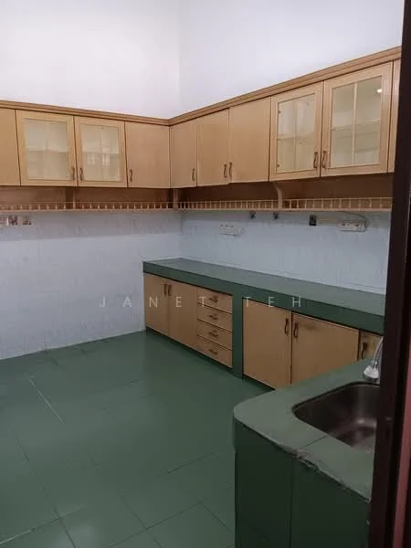 Kitchen features: green laminate countertop, wood cabinetry with glass-front upper cabinets, double-bowl stainless-steel sink, chrome faucet, white tiled backsplash, green tiled flooring, built-in cabinets, wall-mounted electrical outlets, under-cabinet lighting.