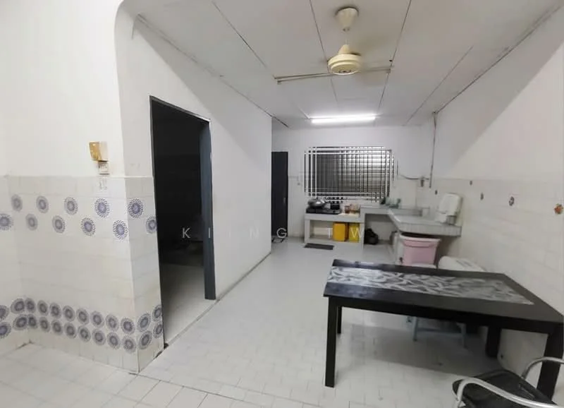 Kitchen features: white tiled walls with blue decorative tiles, white tiled flooring, ceiling fan, single-bowl stainless-steel sink, chrome pull-down faucet, kitchen countertop, wooden dining table, stool, built-in cabinets, window with security bars. Room features: doorway leading to another room.
