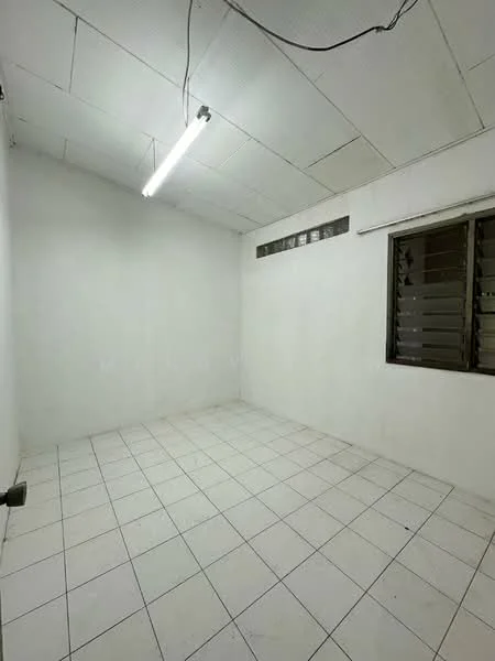 Room features: white painted walls, white ceiling tiles, fluorescent ceiling light, tile flooring, sliding window with grilles, corner window, empty space; style: minimalist.