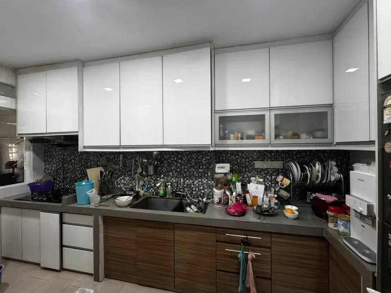 Kitchen features: white high-gloss cabinetry, glass-front upper cabinets, grey stone countertop, double-bowl stainless-steel sink, chrome pull-down faucet, black mosaic tile backsplash, built-in gas hob, built-in range hood, freestanding refrigerator, microwave, various kitchen utensils and appliances, ceramic tile flooring, under-cabinet lighting; style: modern.