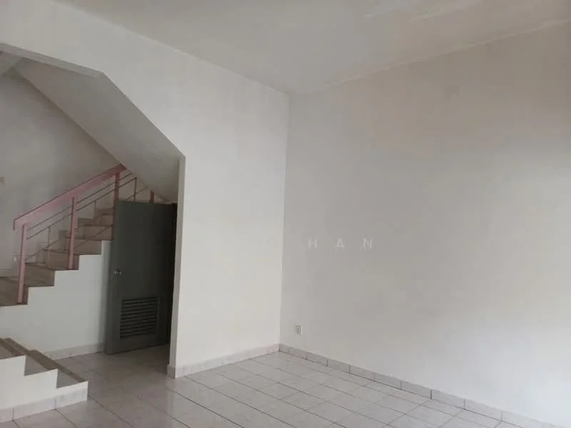 Room features: white painted walls, ceramic tile flooring, staircase with pink railing, door with vent, corner space, empty room.