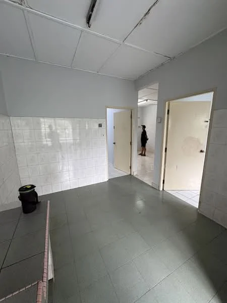 Room features: white tiled walls, grey tiled flooring, plain ceiling, two doors leading to other rooms, window with natural light, corner sink area, minimalist decor; style: modern.