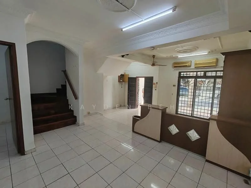 Living features: white painted walls, white tiled flooring, tray ceiling with recessed lighting, 5-blade ceiling fan, large window with grid pattern, wooden staircase leading to upper floor, built-in cabinetry with decorative elements, air conditioning unit, door leading to exterior, open layout; style: modern.
