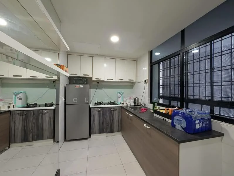 Kitchen features: white cabinets, dark wood lower cabinets, black countertop, stainless-steel fridge, 4-burner gas hob, built-in oven, kitchen sink, wall-mounted cabinets, glass backsplash, tile flooring, large windows, water bottles on countertop, kettle, microwave; style: modern.