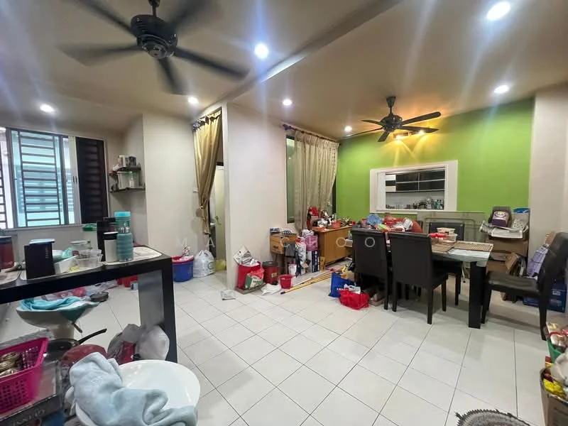 Living features: white painted walls, green accent wall, tile flooring, 5-blade ceiling fan, 2 ceiling fans, dining table with chairs, various boxes and items scattered, curtains, window with grille, open layout, decorative items on shelves.