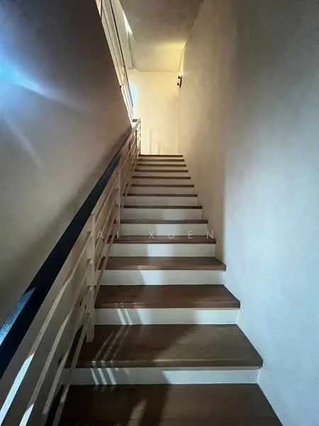 Room features: staircase with wooden steps, white painted walls, handrail, natural light from window, light fixture at the top of the stairs; style: modern.