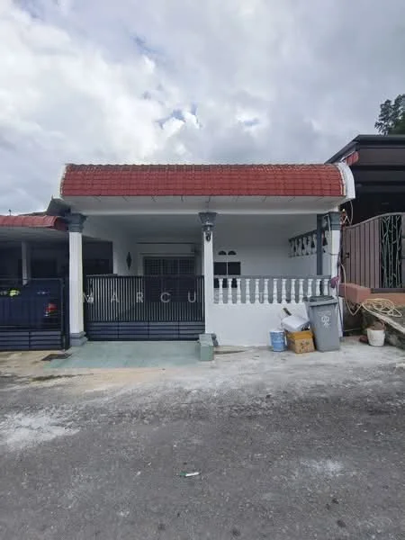 Exterior type: linked terrace house; features: red tiled roof, white painted facade, front porch with railing, two front columns, black metal gate, grey driveway, visible garbage bins, concrete walkway; style: traditional.
