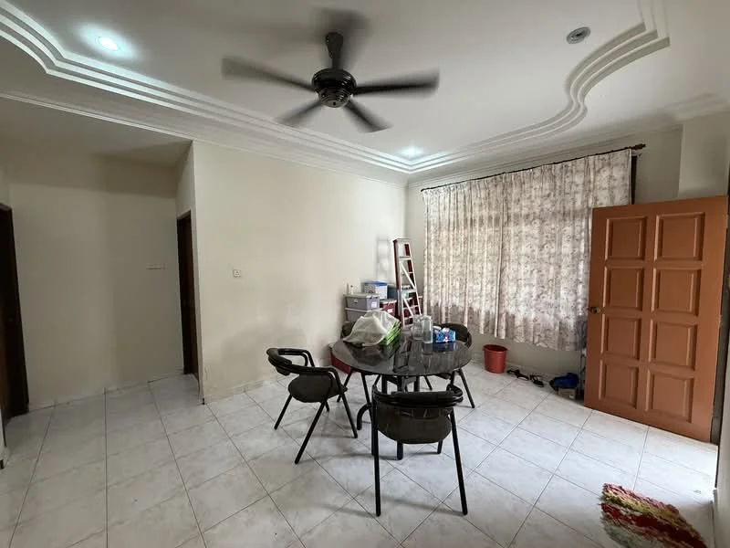 Dining features: round dining table, 4 black plastic chairs, 5-blade ceiling fan with light, white painted walls, tile flooring, curtains with floral pattern, ladder against the wall, window with natural light, door with multiple panels, red plastic bin.