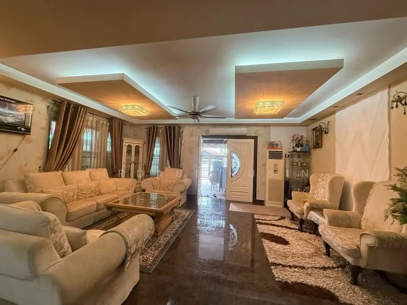 Living features: cream upholstered 3-seater sofa, cream upholstered 2-seater sofa, 2 armchairs with floral pattern, glass coffee table, area rug with geometric pattern, wall-mounted TV, ceiling fan with light, recessed downlights, cream painted walls, dark polished tile flooring, curtains in brown, decorative wall paneling, entrance door with circular window, air conditioning unit; style: traditional.