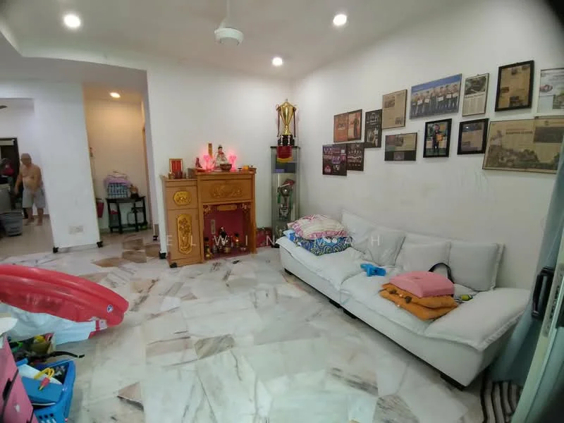Living features: white leather sofa, marble flooring, ceiling fan, wall-mounted decorations, framed photographs, wooden cabinet, decorative trophies, colorful cushions, plastic storage bins, inflatable pool toy.